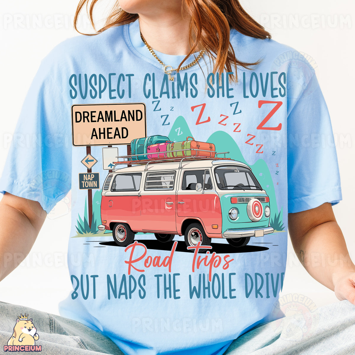 a woman wearing a blue shirt with a vw van on it