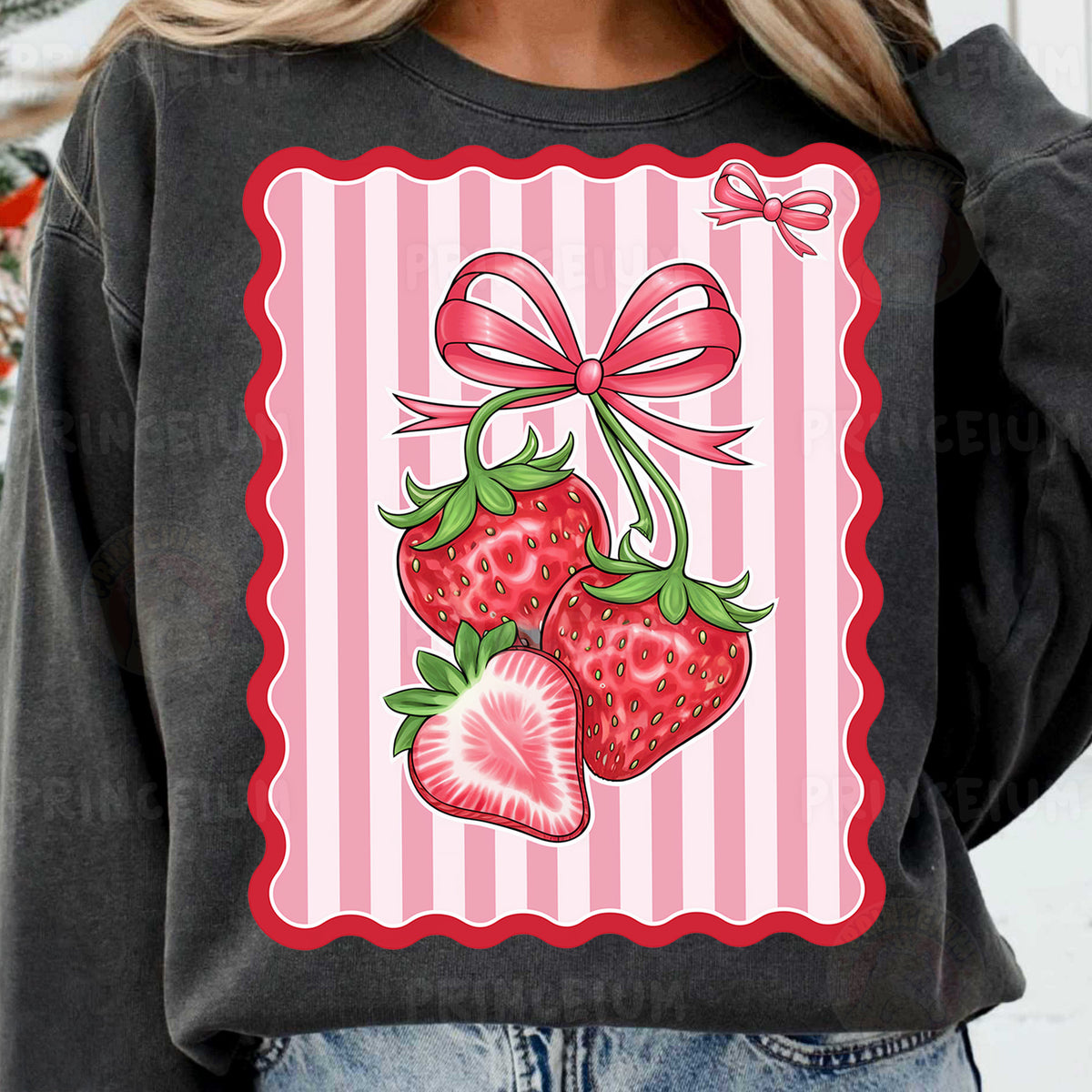 a woman wearing a sweatshirt with a bow and two strawberries on it