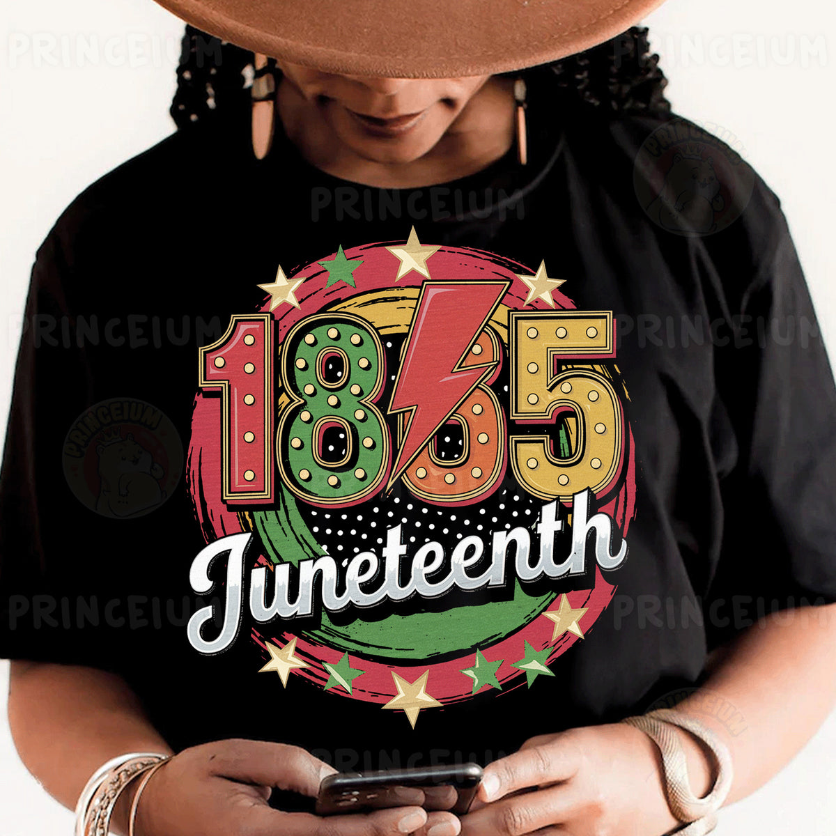 a person wearing a black shirt and a hat holding a cell phone