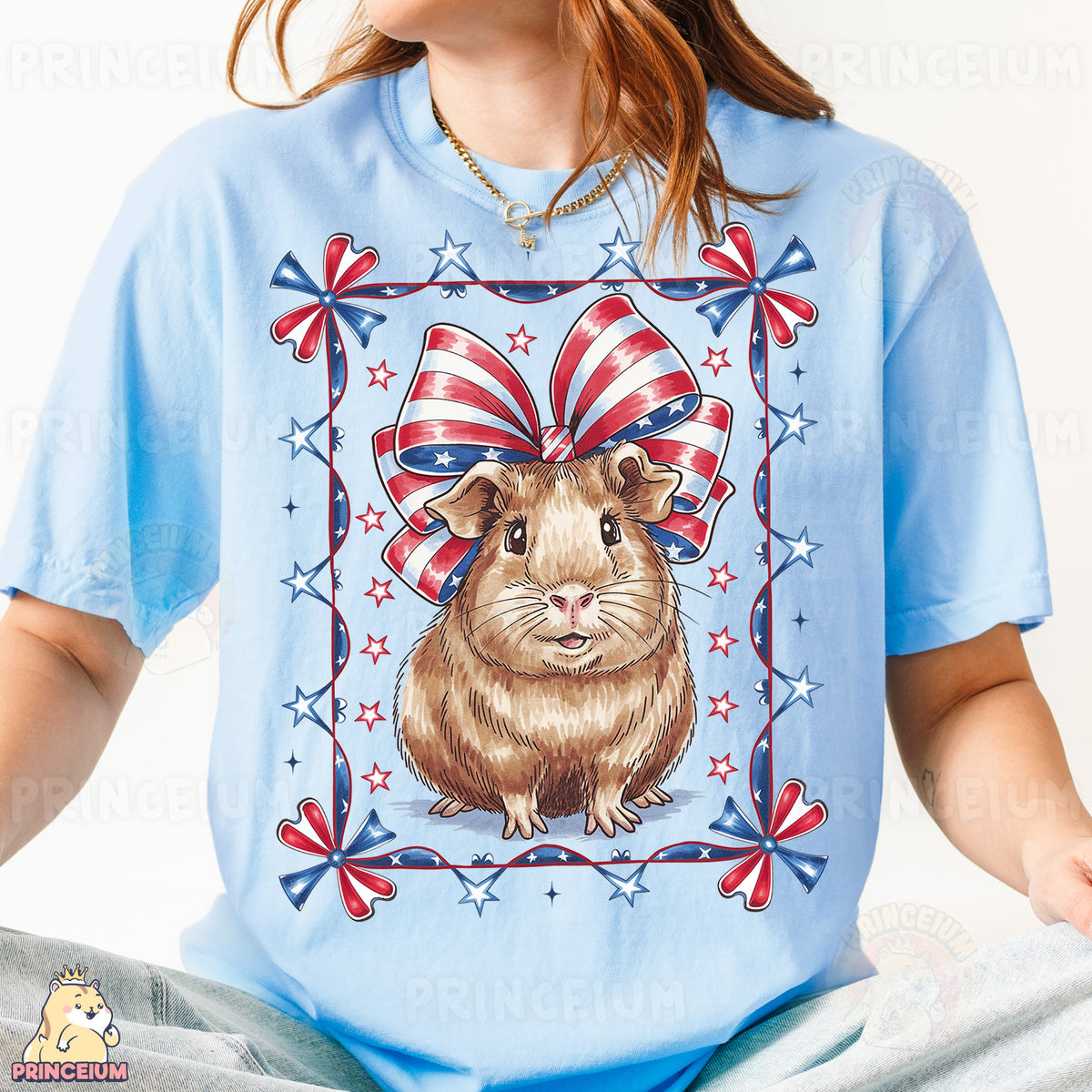 a woman wearing a blue shirt with a picture of a hamster on it