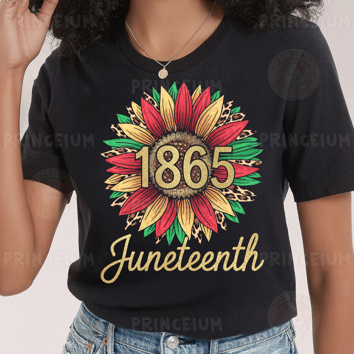a woman wearing a black shirt with a sunflower on it