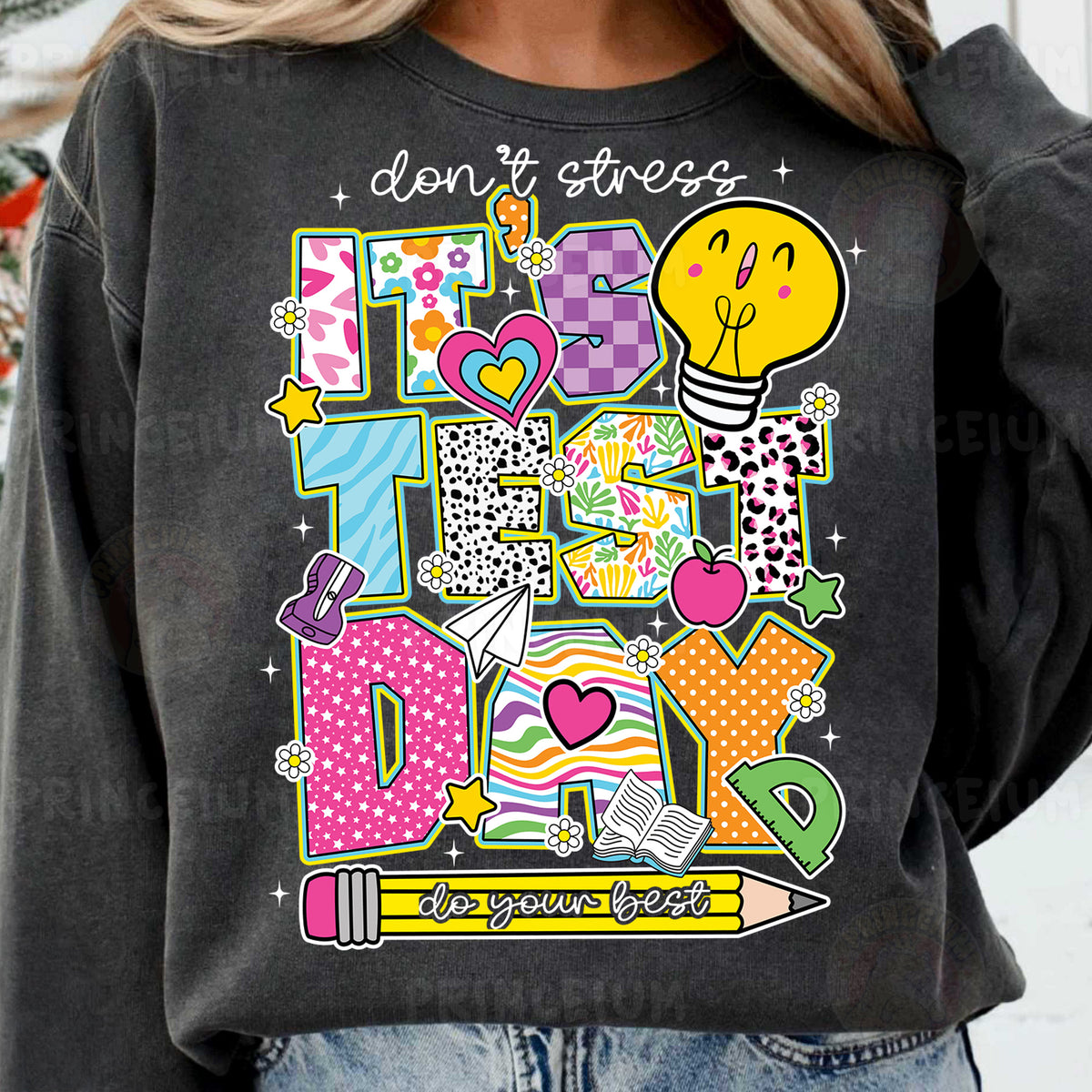 a woman wearing a sweatshirt that says don't stress it