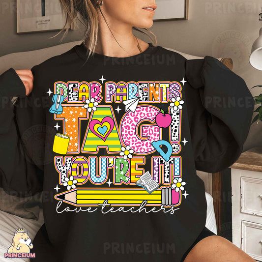 a woman wearing a black shirt that says happy birthday