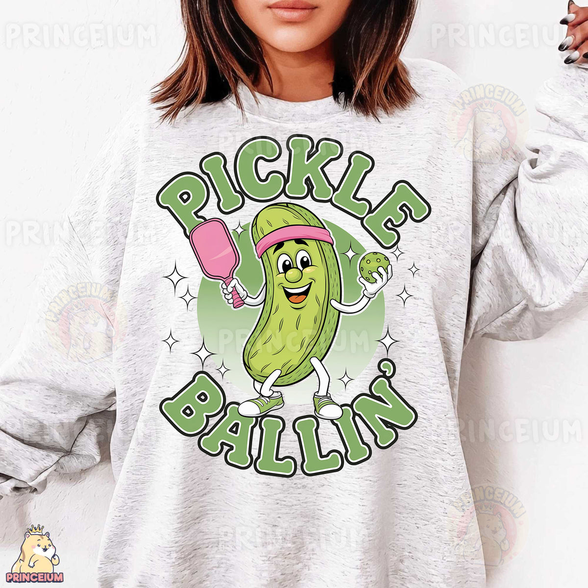 a woman wearing a pickle ballin sweatshirt