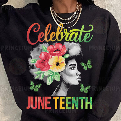a woman wearing a black sweatshirt with flowers on it