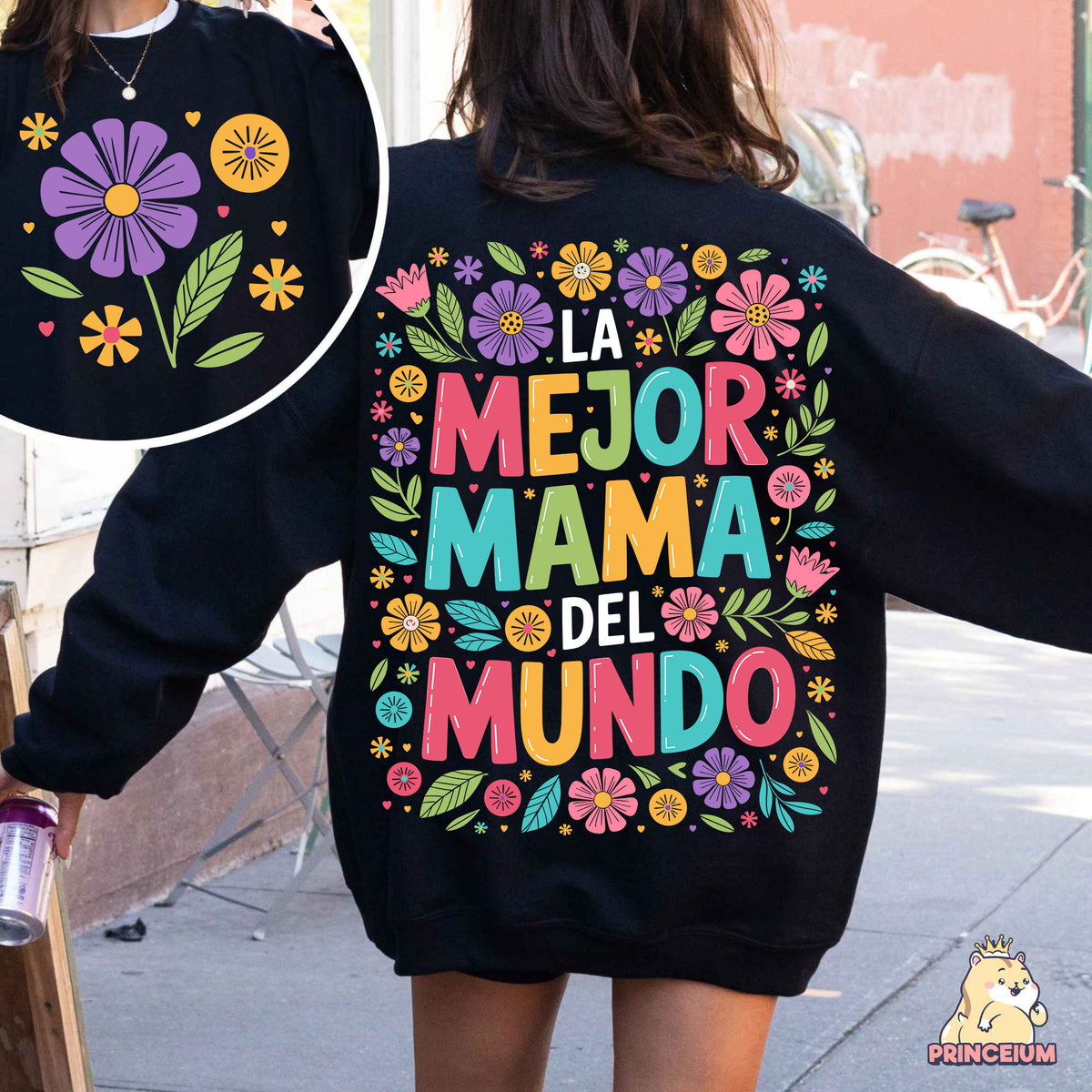 a woman walking down a street wearing a black sweatshirt