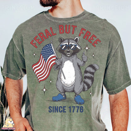 a man wearing a t - shirt with a raccoon holding an american flag