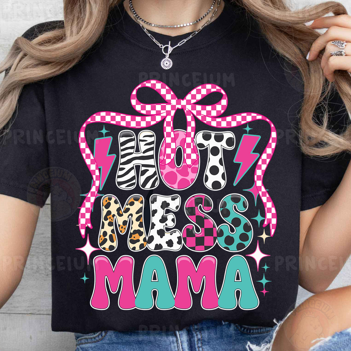 a woman wearing a black tshirt with a pink bow
