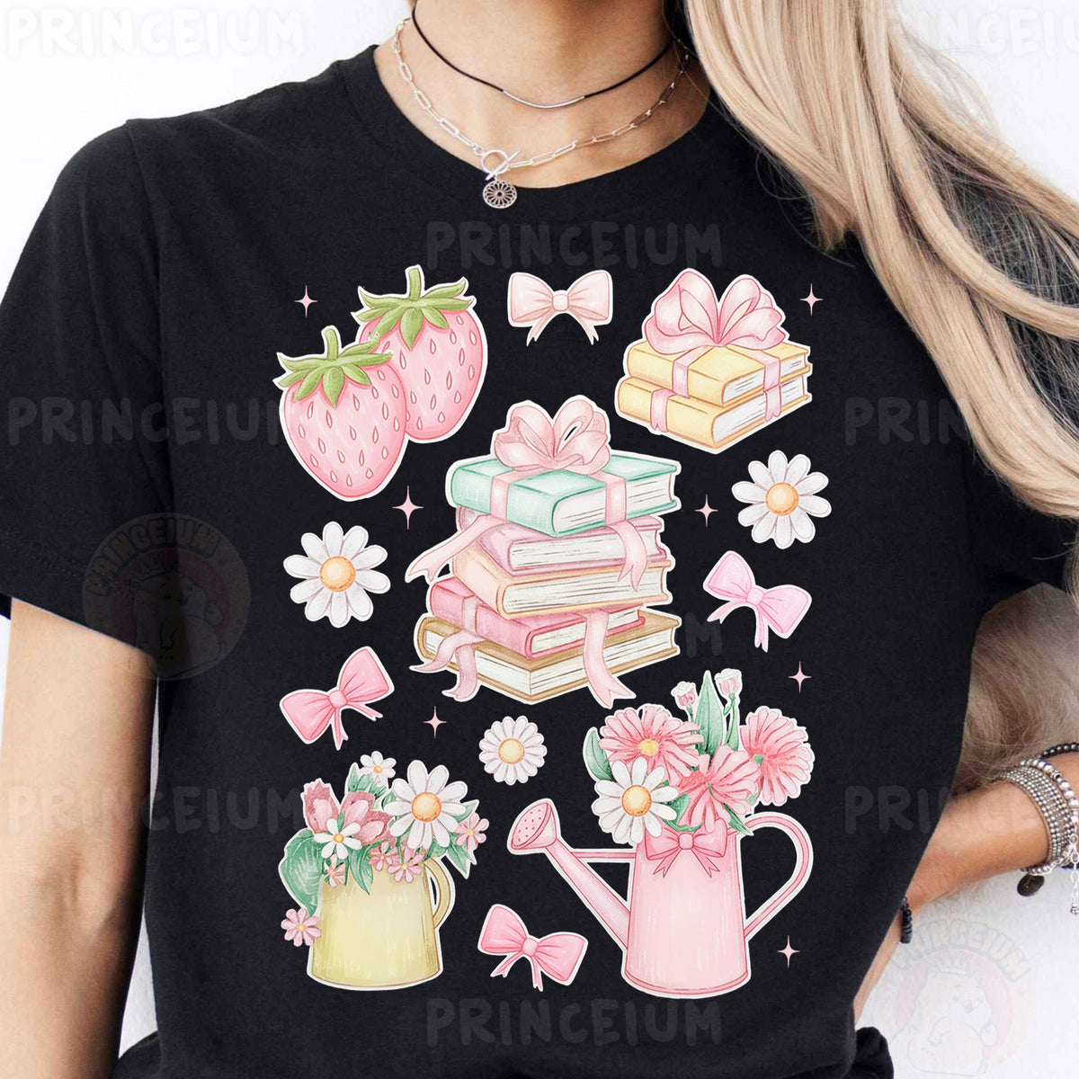 a woman wearing a black tshirt with pink flowers and strawberries on it