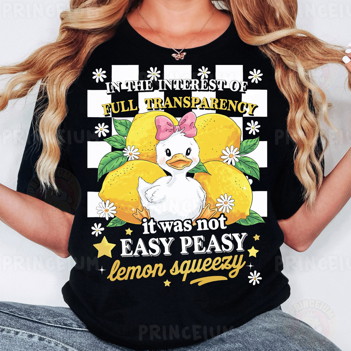 a woman wearing a black t - shirt with an image of a chicken on it