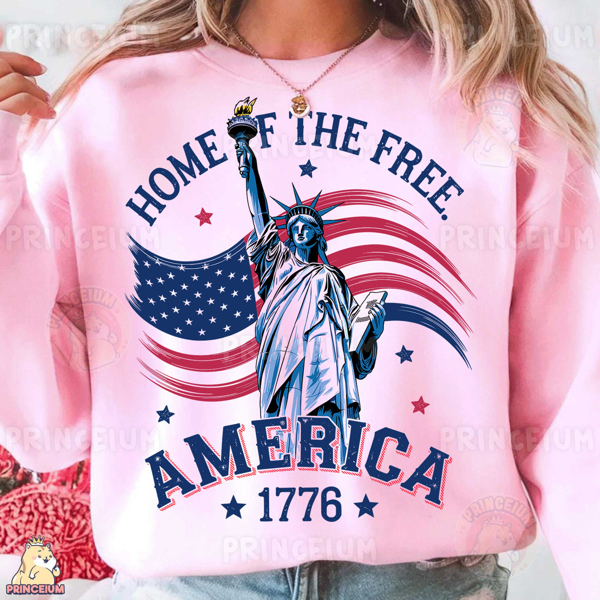 a woman wearing a pink sweatshirt with the statue of liberty on it