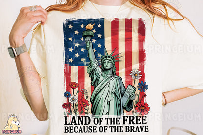 a woman wearing a t - shirt that says land of the free because of the