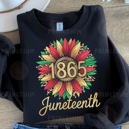 a black shirt with a sunflower and the words juneteeth printed on it
