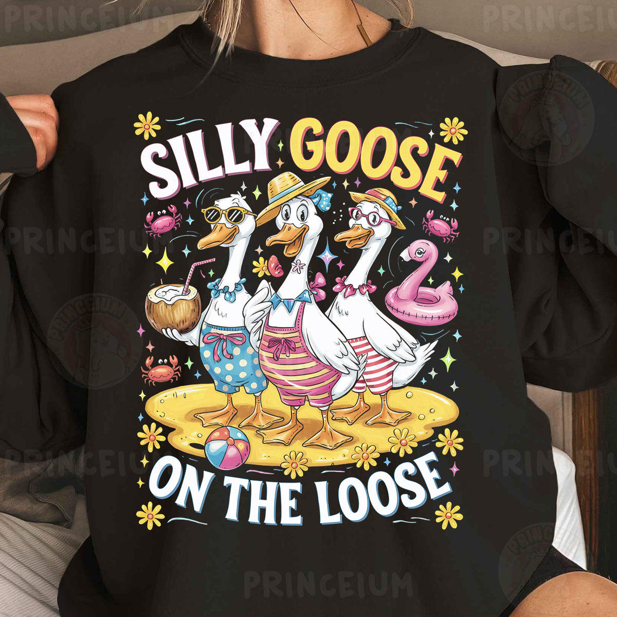 a woman wearing a black shirt that says silly goose on the loose