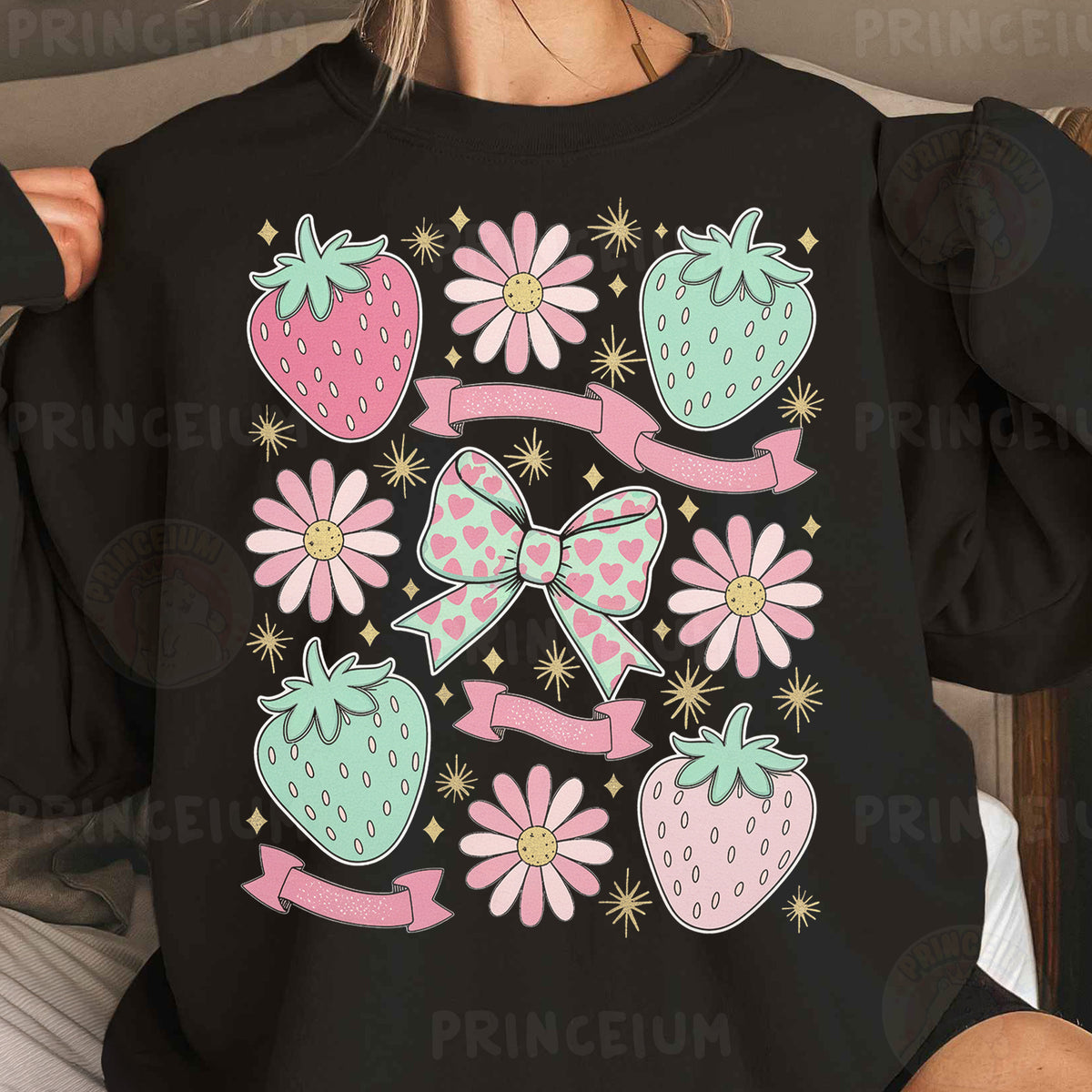 a woman wearing a black shirt with pink and green bows and strawberries on it