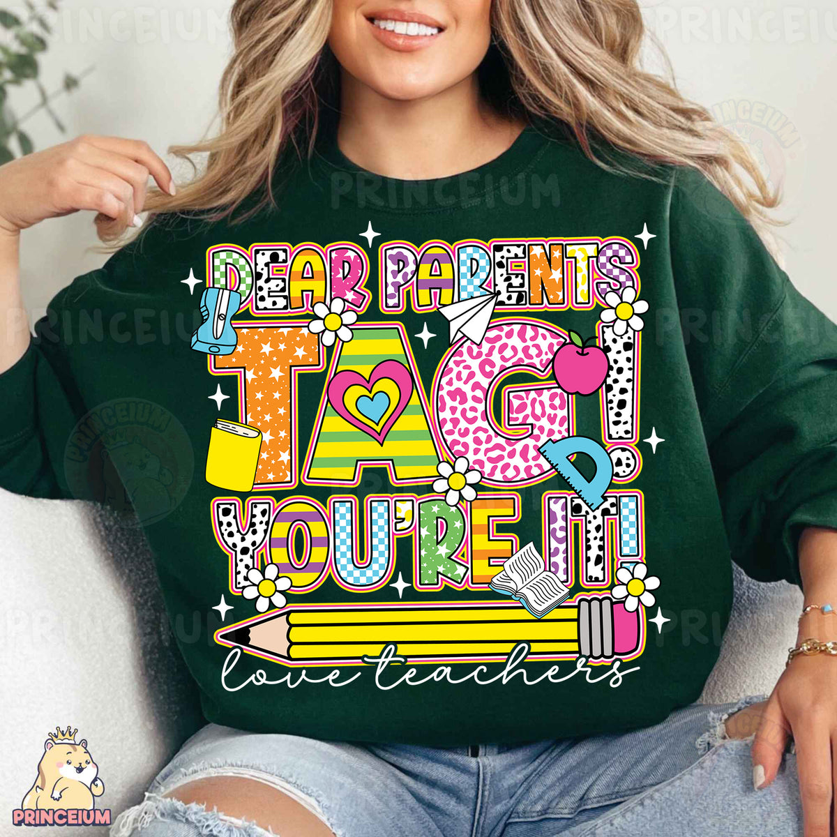 a woman sitting on a couch wearing a green shirt