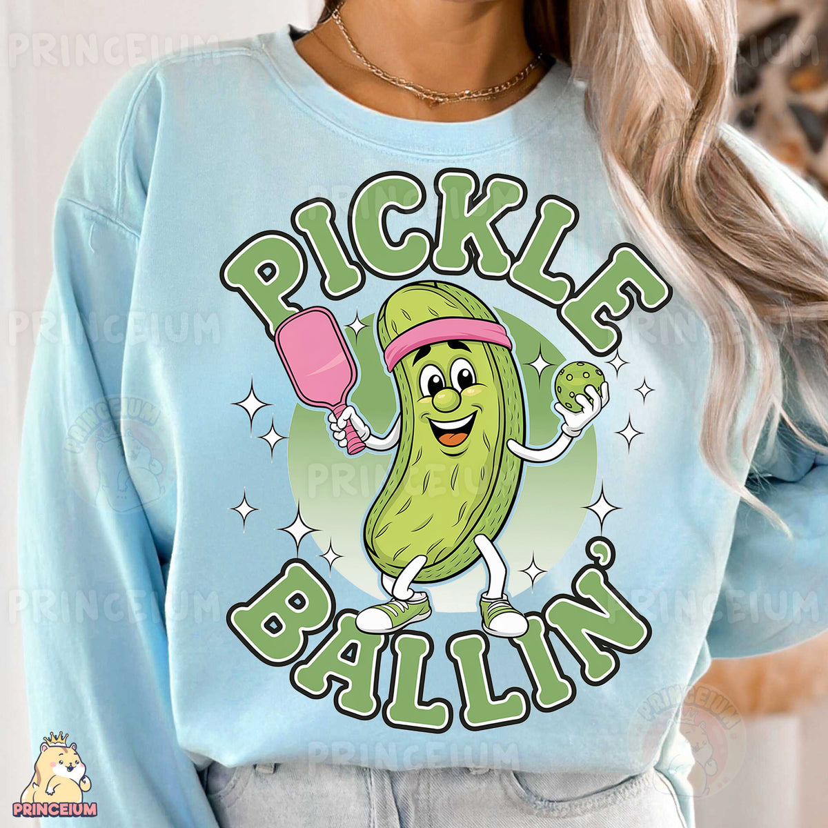 a woman wearing a pickle ballin sweatshirt