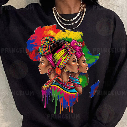 a woman wearing a black sweatshirt with a painting of two african women