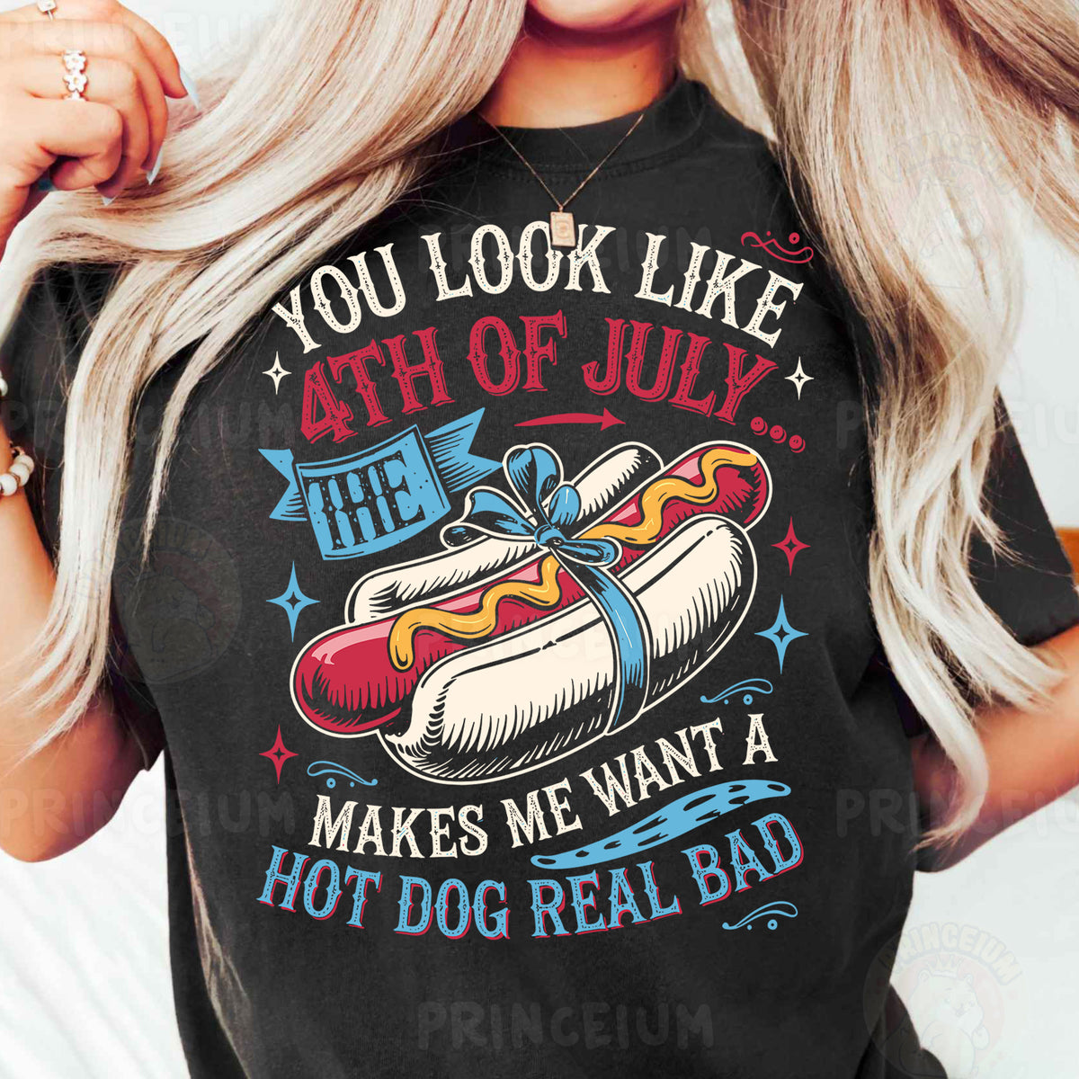 a woman wearing a black shirt with a hot dog on it