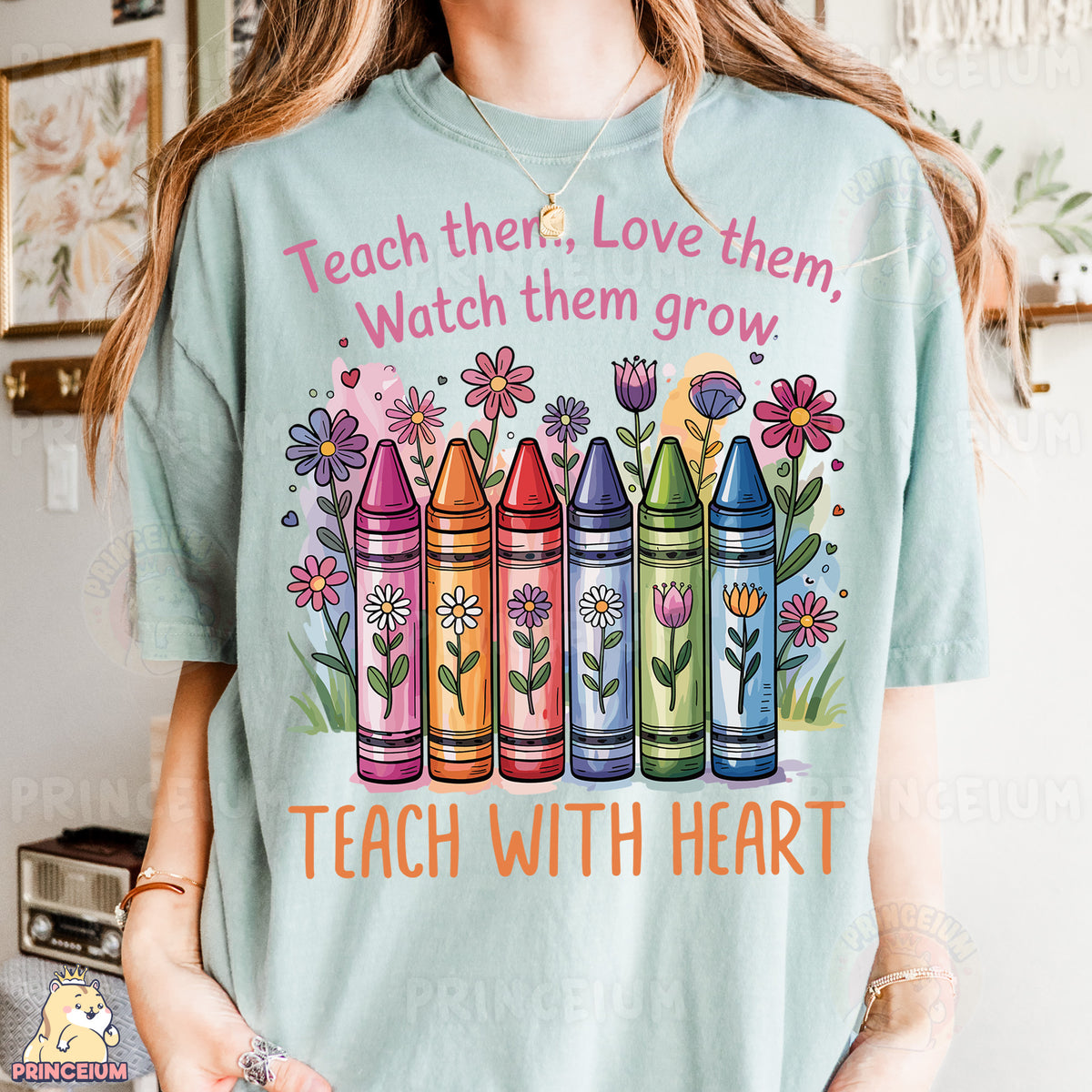 a woman wearing a t - shirt that says teach them love them, watch them