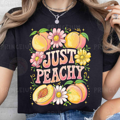 a woman wearing a t - shirt that says just peachy