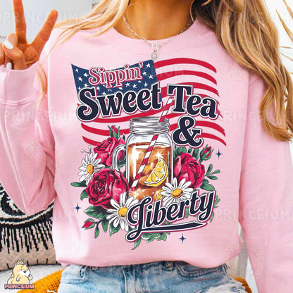 a woman wearing a pink sweatshirt with a jar of tea on it