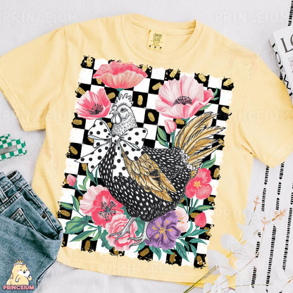 a t - shirt with a chicken and flowers on it