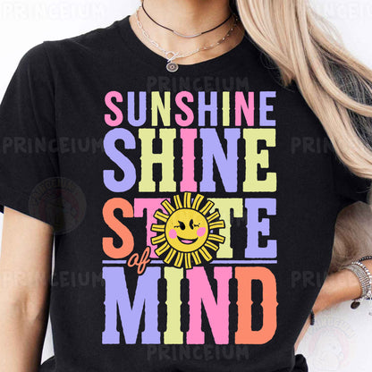 a woman wearing a black shirt that says sunshine shine smile mind