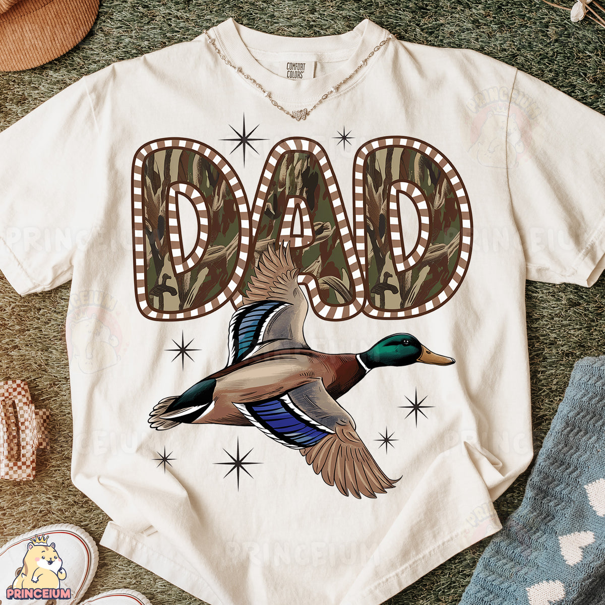 a t - shirt with a picture of a duck on it