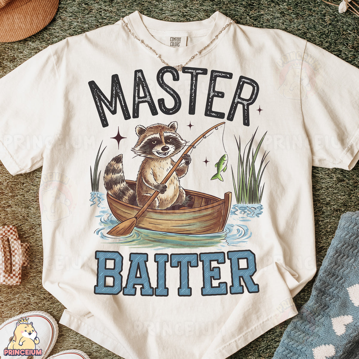 a shirt with a raccoon fishing on it