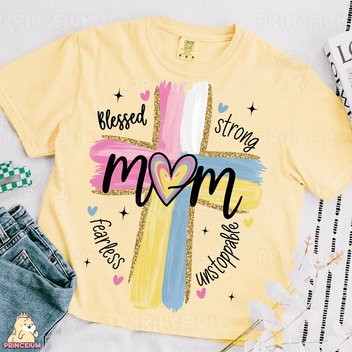 a t - shirt with a cross and a heart on it