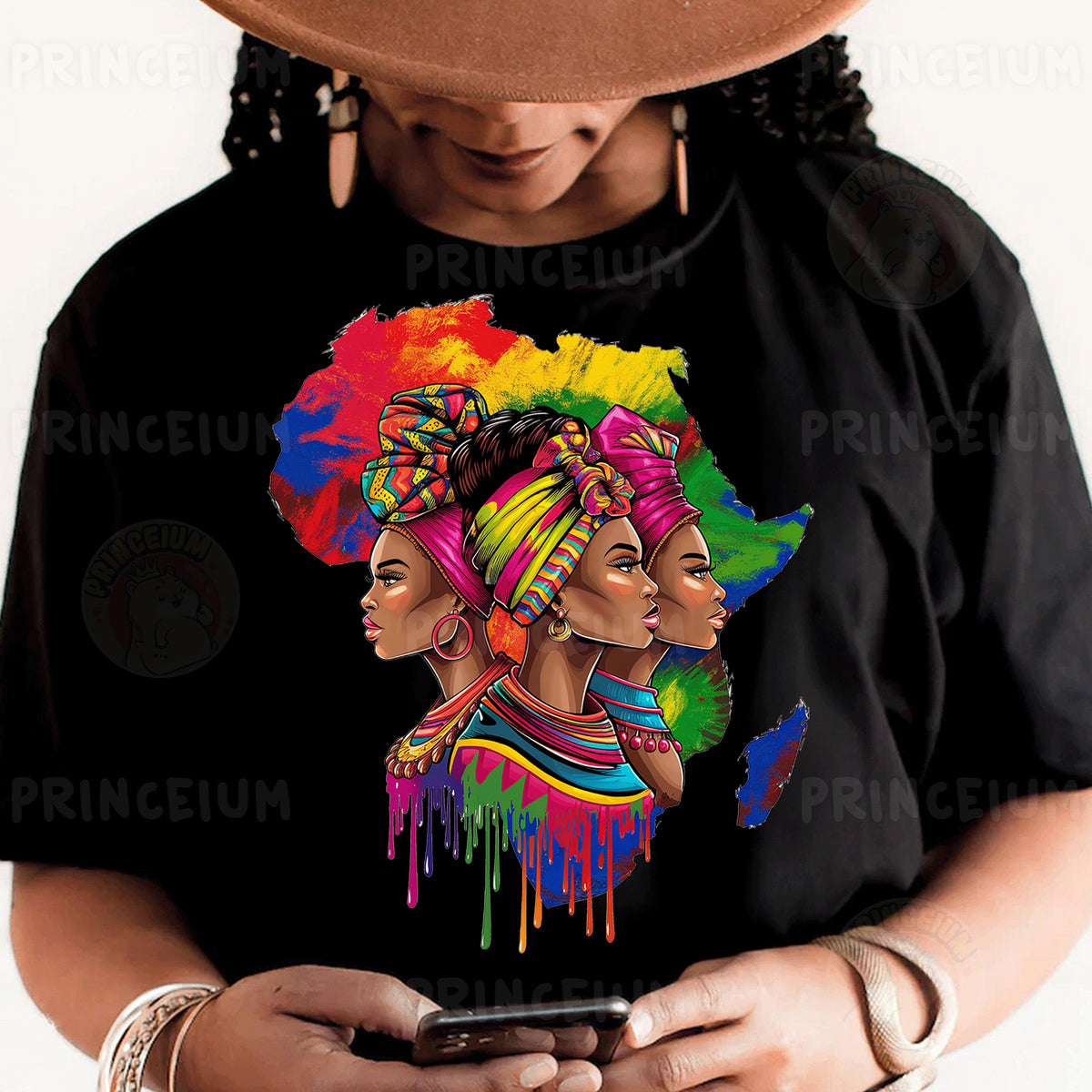 a woman holding a cell phone wearing a t - shirt with a picture of two