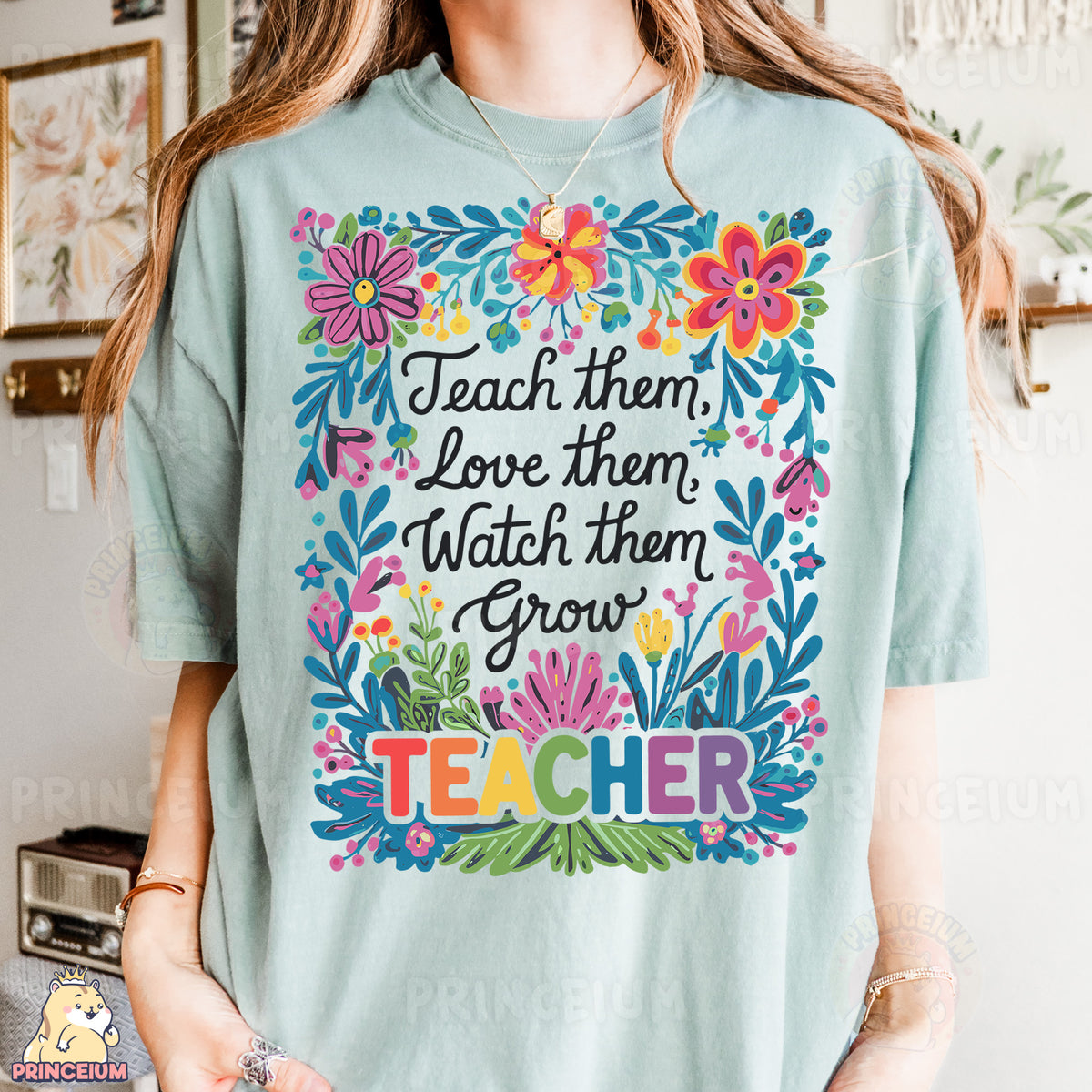 a woman wearing a t - shirt that says teach them, love them, watch