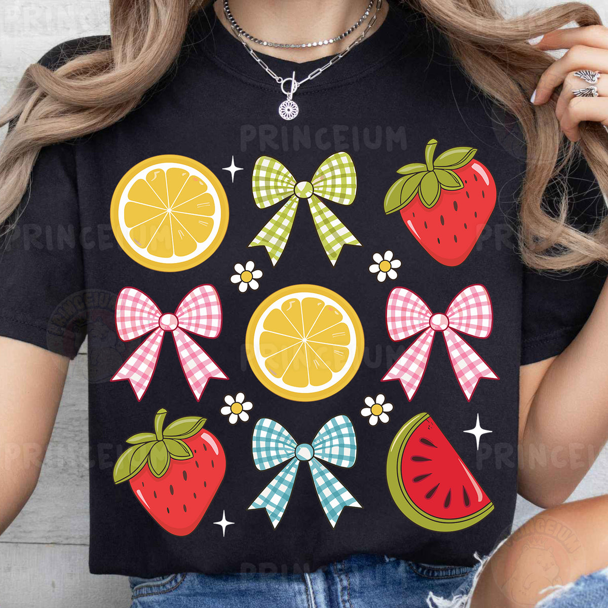 a woman wearing a t - shirt with fruit and bows on it