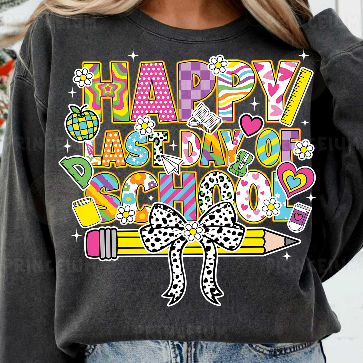 a woman wearing a black happy birthday sweatshirt