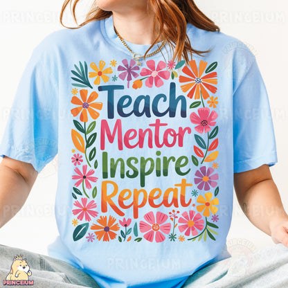 a woman sitting in a lotus position with a t - shirt saying teach mentor inspire
