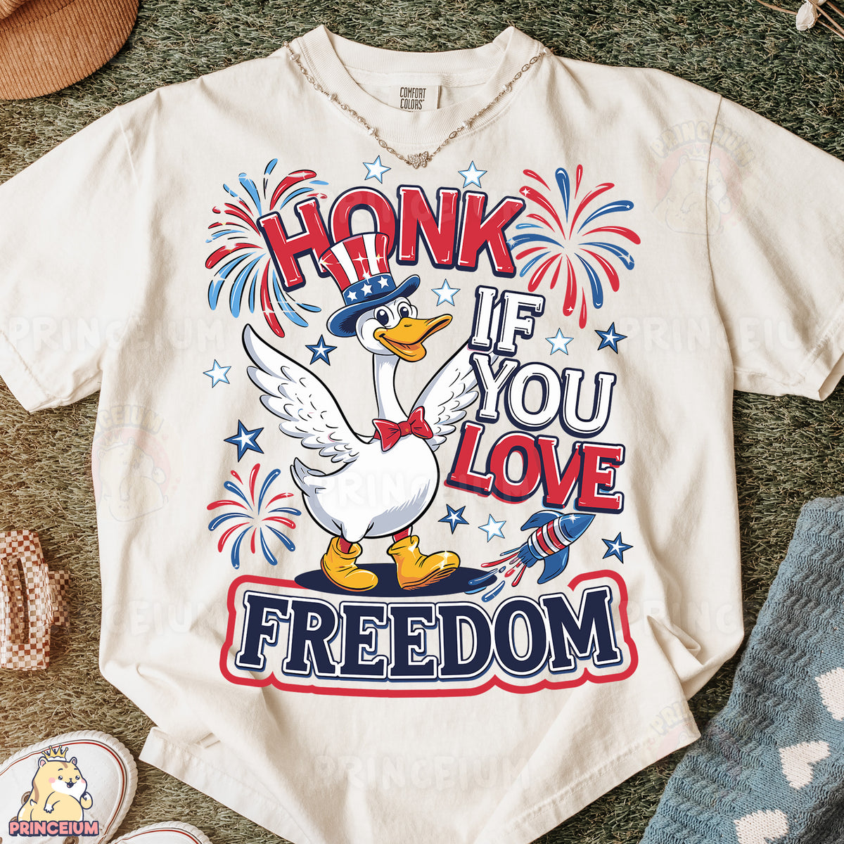 a t - shirt with a duck wearing a hat and fireworks