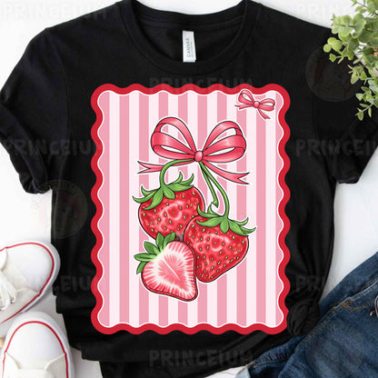 a black shirt with two strawberries on it