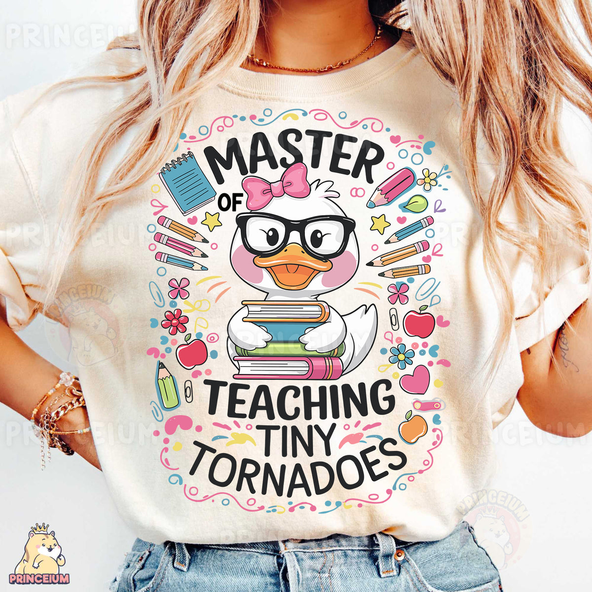 a woman wearing a t - shirt that says, master of teaching tiny tornad