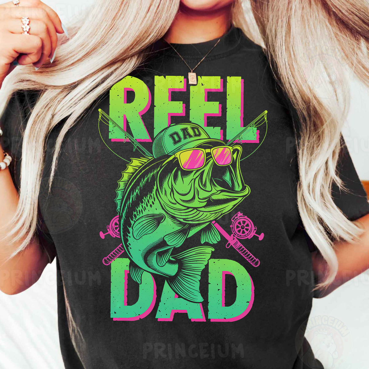 a woman wearing a t - shirt that says reel dad