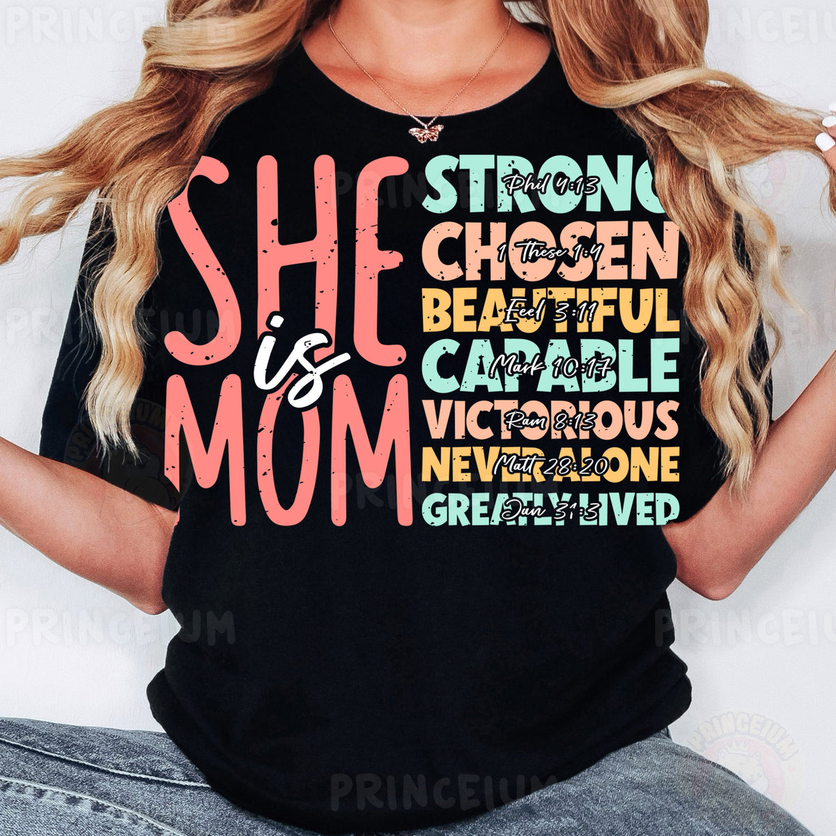 a woman wearing a black shirt that says she is a mom