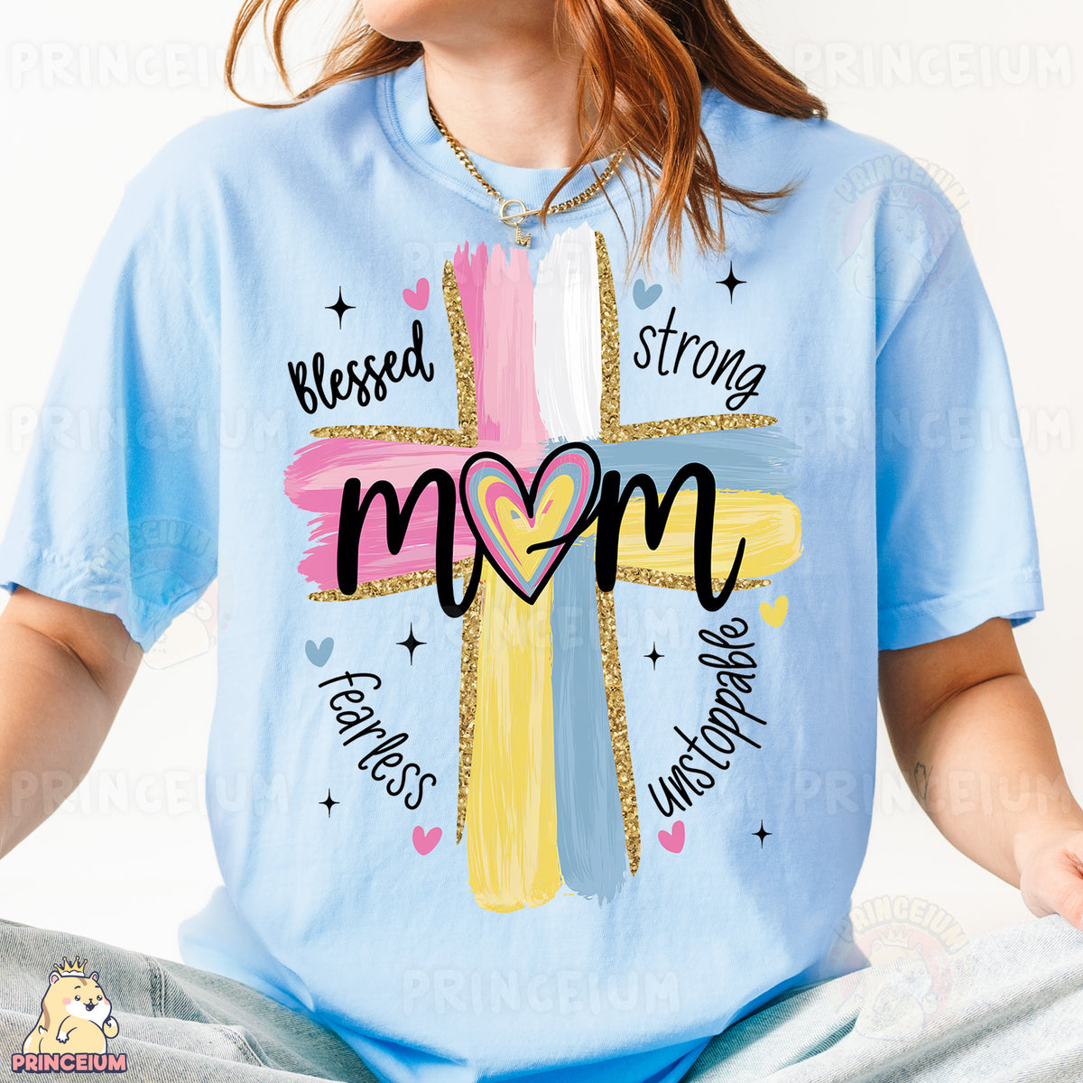 a woman wearing a blue shirt with a cross on it