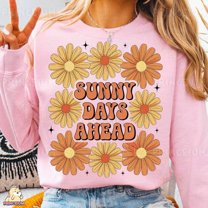 a woman wearing a pink shirt that says sunny days ahead