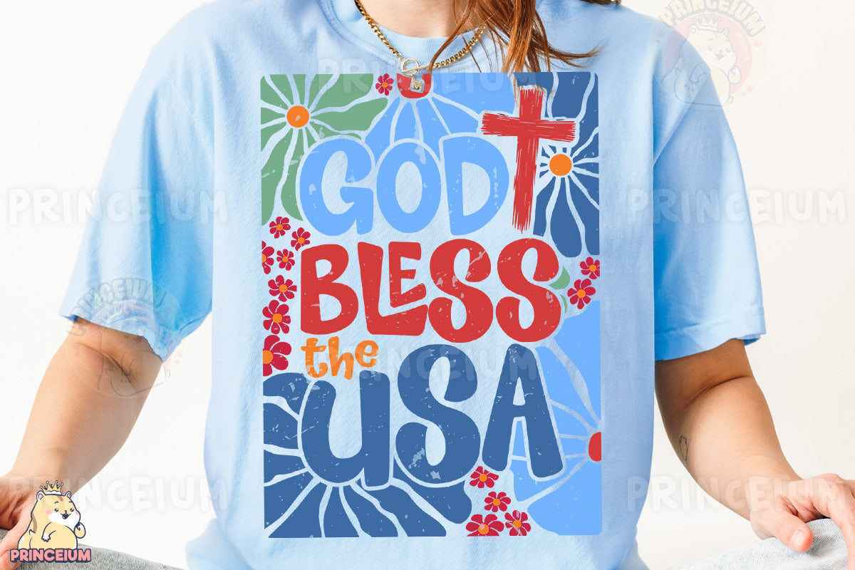 a woman wearing a blue t - shirt with the words god, bless, and