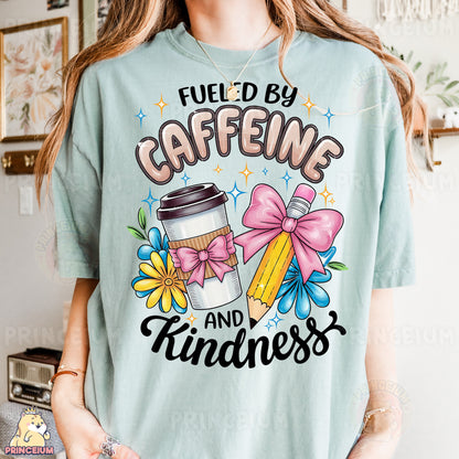 a woman wearing a t - shirt that says fueled by caffeine and kindness