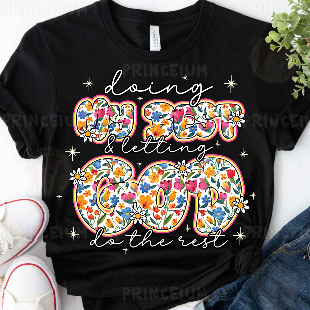 a black t - shirt with a floral design on it