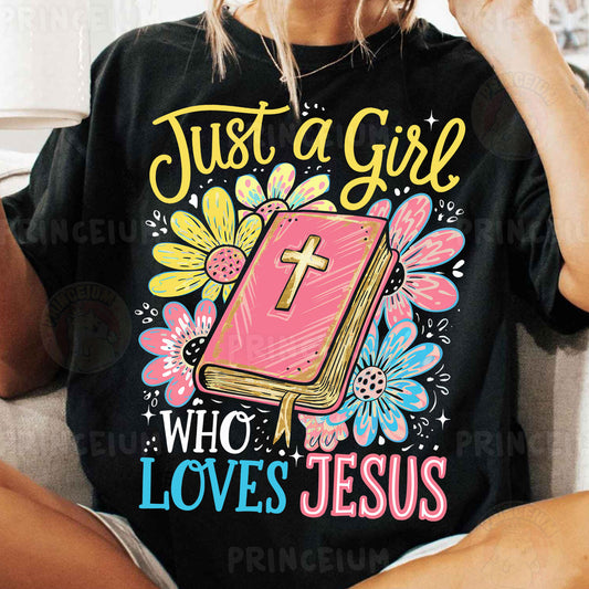 a woman sitting on a couch wearing a t - shirt that says just a girl