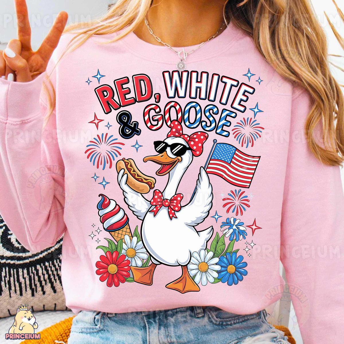 a woman wearing a red white and goose shirt