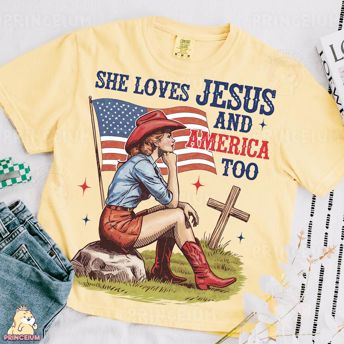 a t - shirt that says she loves jesus and america too