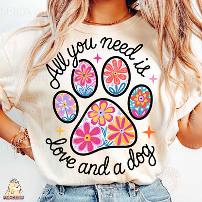 a woman wearing a t - shirt with a dog's paw on it